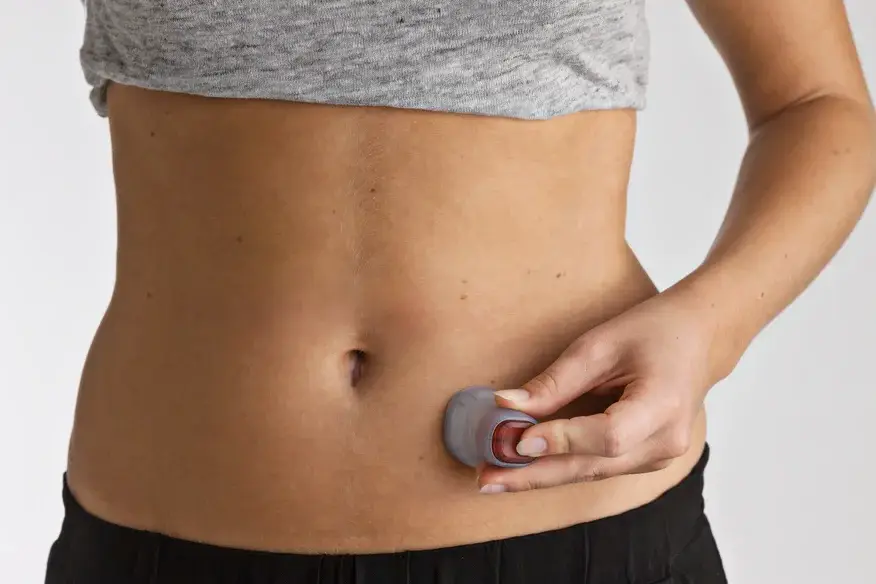 An image of a woman inserting the Neria Guard An image of a woman inserting the Neria Guard