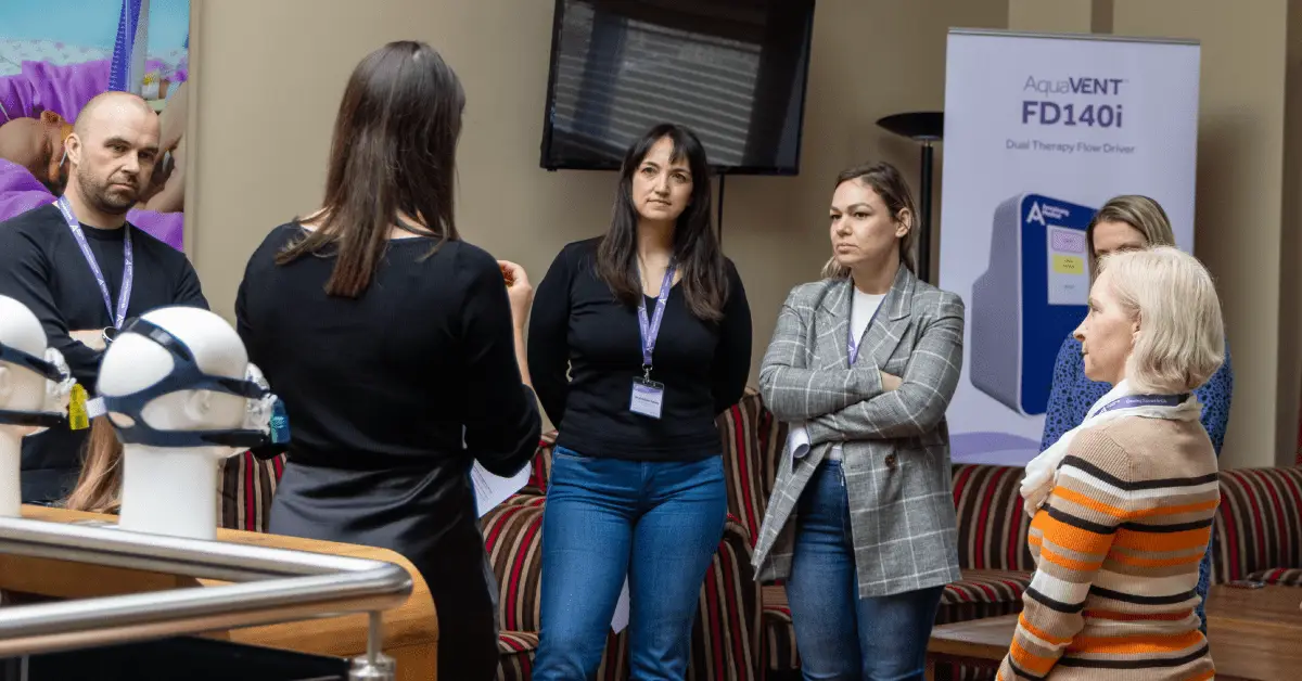 Educator presenting to a group of respiratory care nurses