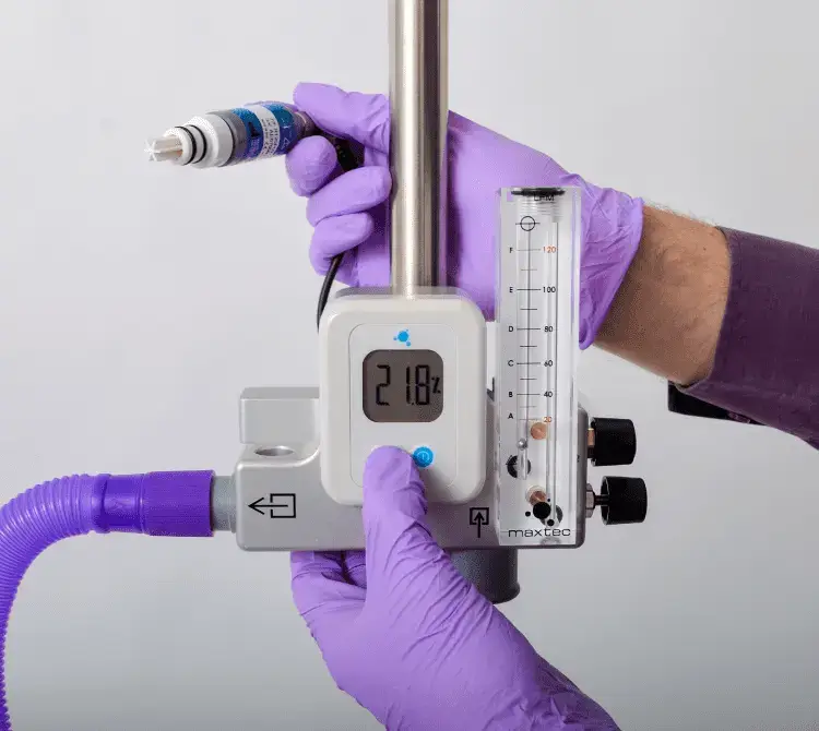 A medical professional setting up an Armstrong Medical Max Venturi flow driver. A medical professional setting up an Armstrong Medical Max Venturi flow driver.